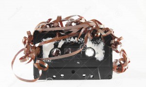vintage-musicassette-ancient-used-over-white-background-34472254